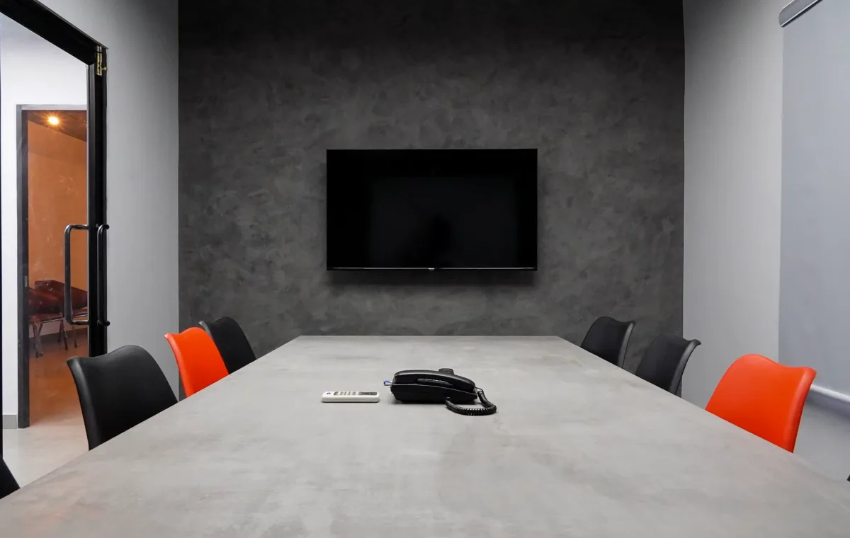 Meeting room with a wall-mounted display