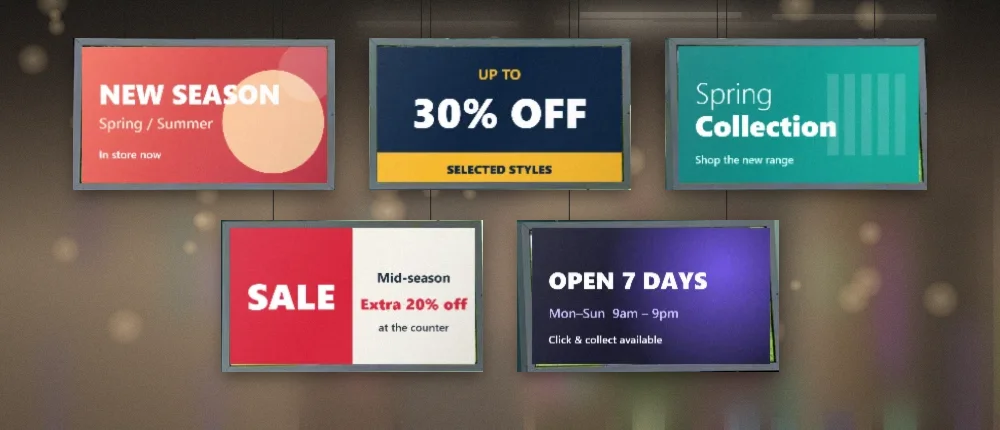 Digital signage screens hanging in a retail store